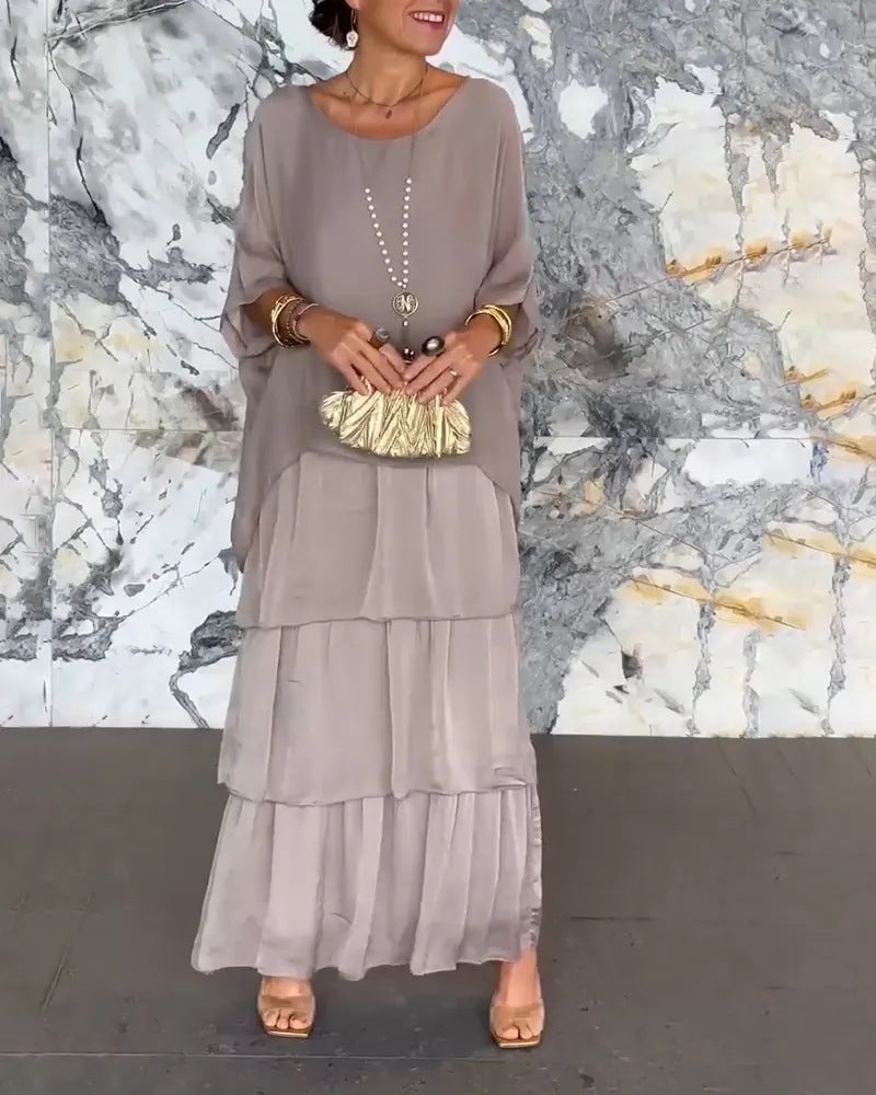 💎 -50% OFERTA LIMITADA! 💎 Vestido Maxi Artístico – Corte Largo, Design Batwing e Elegância Fluida
