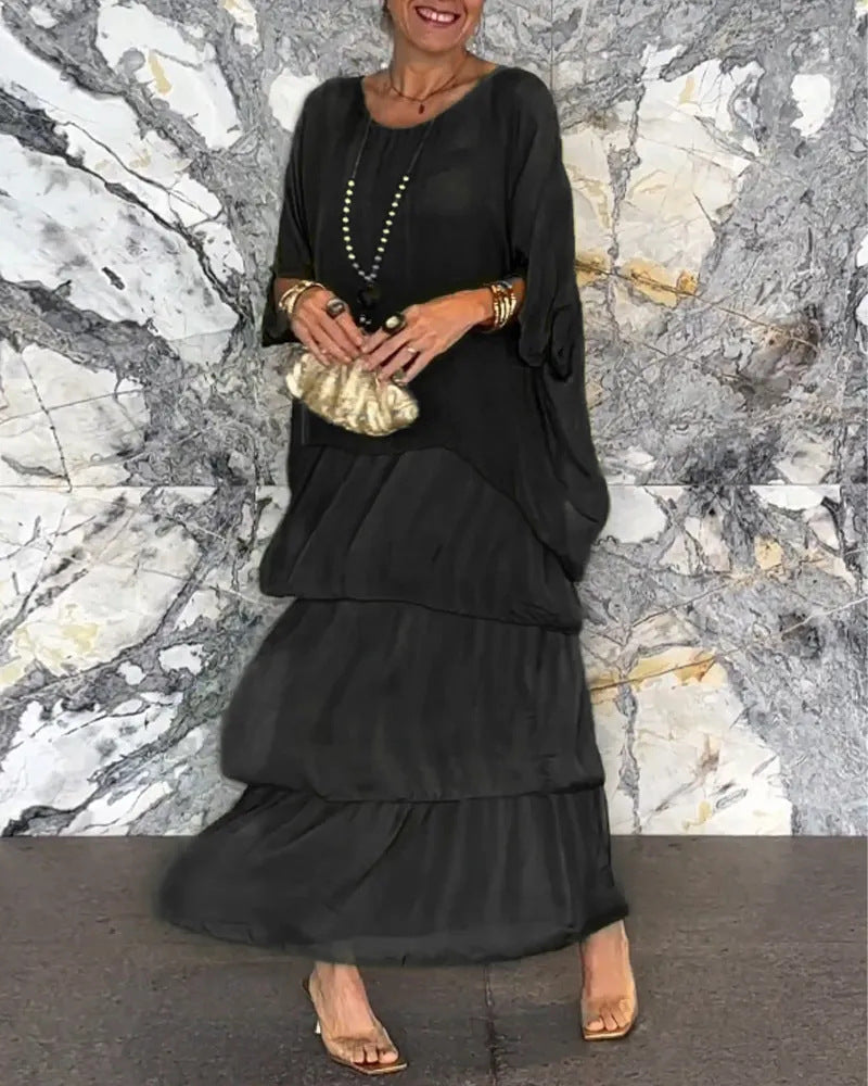 💎 -50% OFERTA LIMITADA! 💎 Vestido Maxi Artístico – Corte Largo, Design Batwing e Elegância Fluida