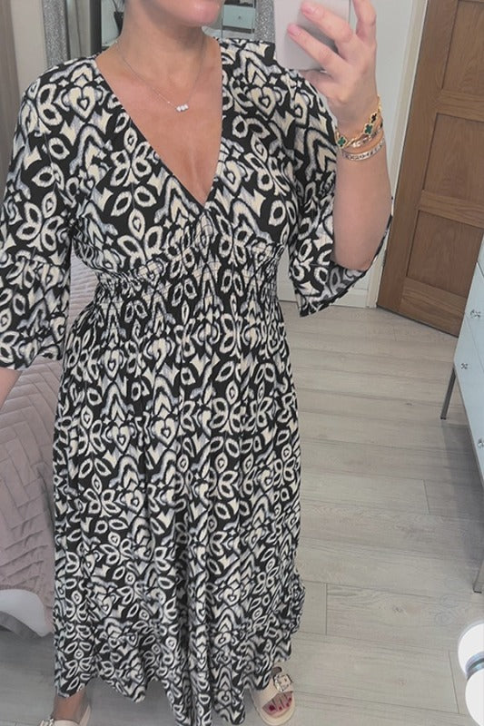 🔥Desconto sazonal de 50%🔥Vestido às flores com decote em V