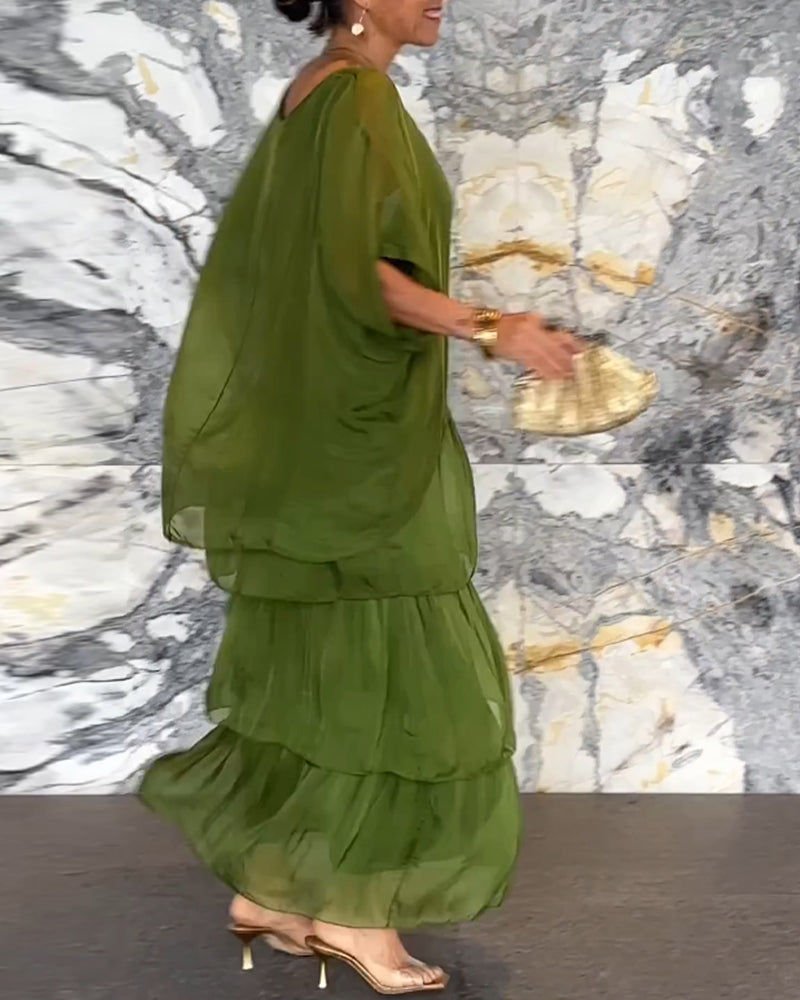 💎 -50% OFERTA LIMITADA! 💎 Vestido Maxi Artístico – Corte Largo, Design Batwing e Elegância Fluida