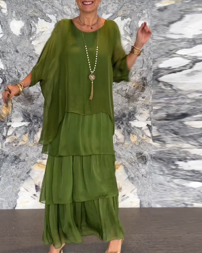 💎 -50% OFERTA LIMITADA! 💎 Vestido Maxi Artístico – Corte Largo, Design Batwing e Elegância Fluida