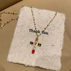 💎 50% DESCONTO!! ✝️ Colar colorido com pendente de cruz de strass – brilho intenso, comprimento ajustável e um look marcante ✨