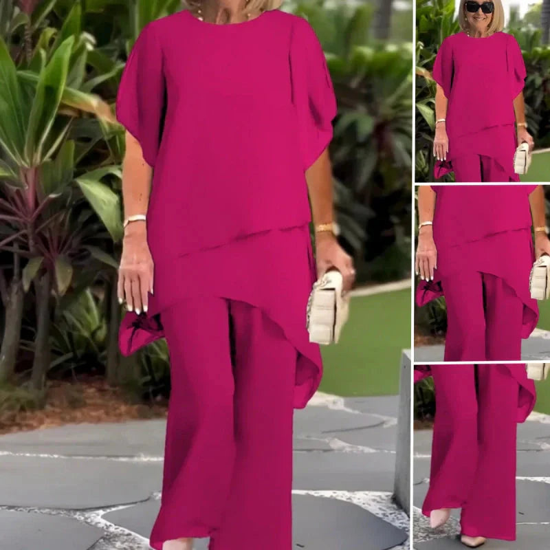 Encantador conjunto de blusa irregular e calças pantalona