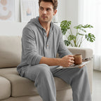 Conjunto de 2 peças com camisola com capuz e calças largas casuais para homem