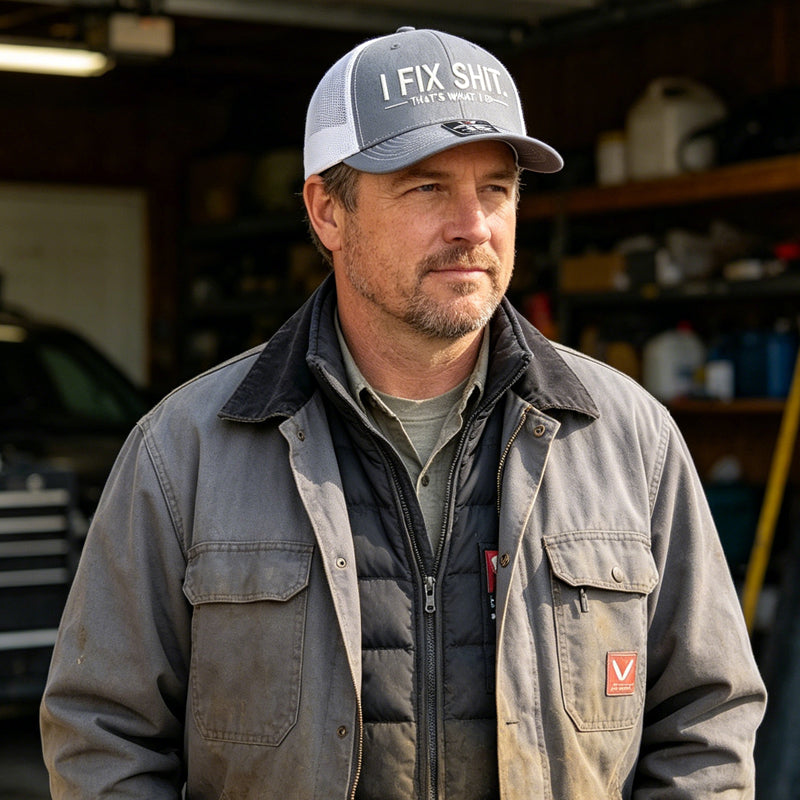 Boné trucker com parte traseira em rede e bordado “I Fix Shit”