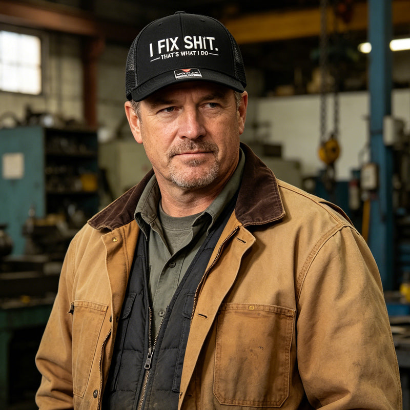 Boné trucker com parte traseira em rede e bordado “I Fix Shit”