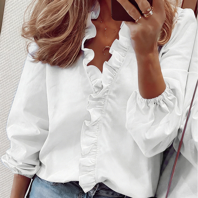 Blusa de mulher de manga comprida com decote em V e folhos