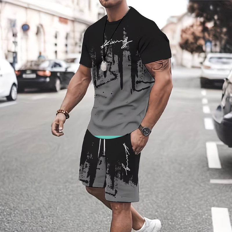 👕 50% DESCONTO AGORA! 🔥 Conjunto de t-shirt e calções para homem com estampado gráfico – Tecido macio, design arrojado e perfeito para os dias de verão ☀️
