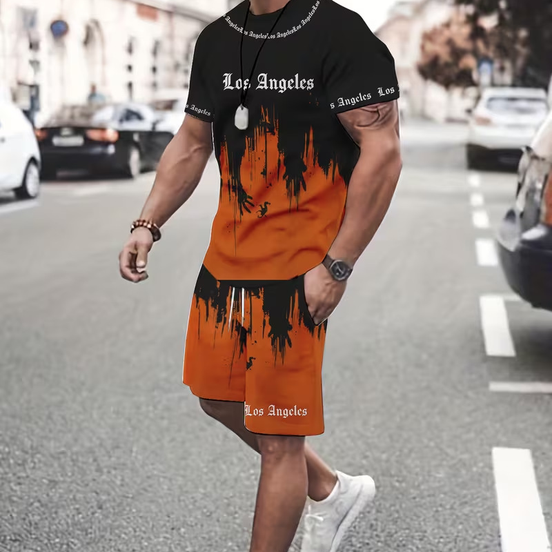 👕 50% DESCONTO AGORA! 🔥 Conjunto de t-shirt e calções para homem com estampado gráfico – Tecido macio, design arrojado e perfeito para os dias de verão ☀️
