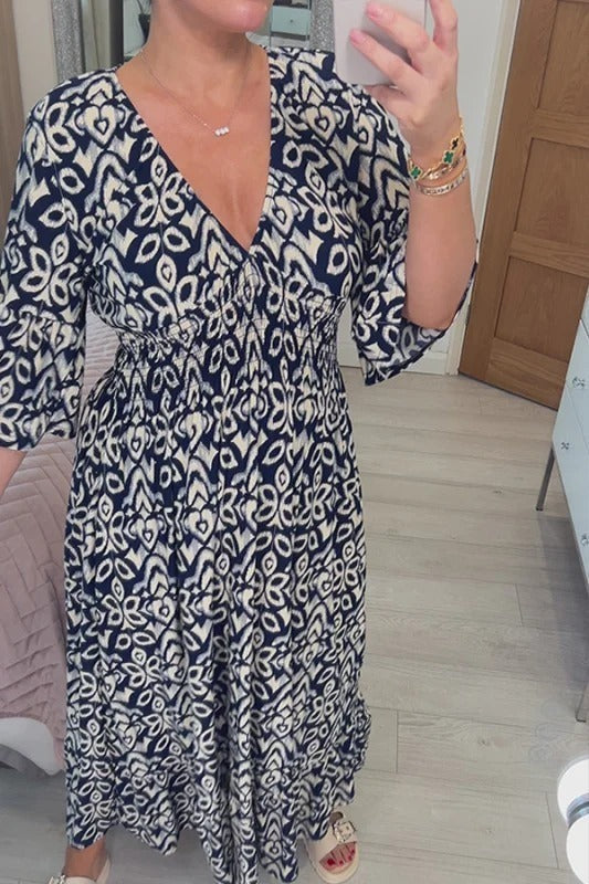 🔥Desconto sazonal de 50%🔥Vestido às flores com decote em V